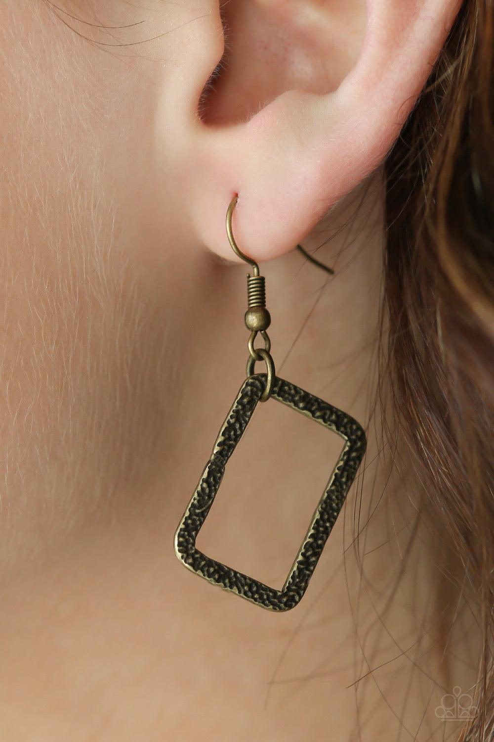 Paparazzi Accessories Seattle Scene - Brass Delicately hammered in light-catching shimmer, rows of glistening rectangular frames link below the collar for a bold industrial style. Features an adjustable clasp closure. Sold as one individual necklace. Incl