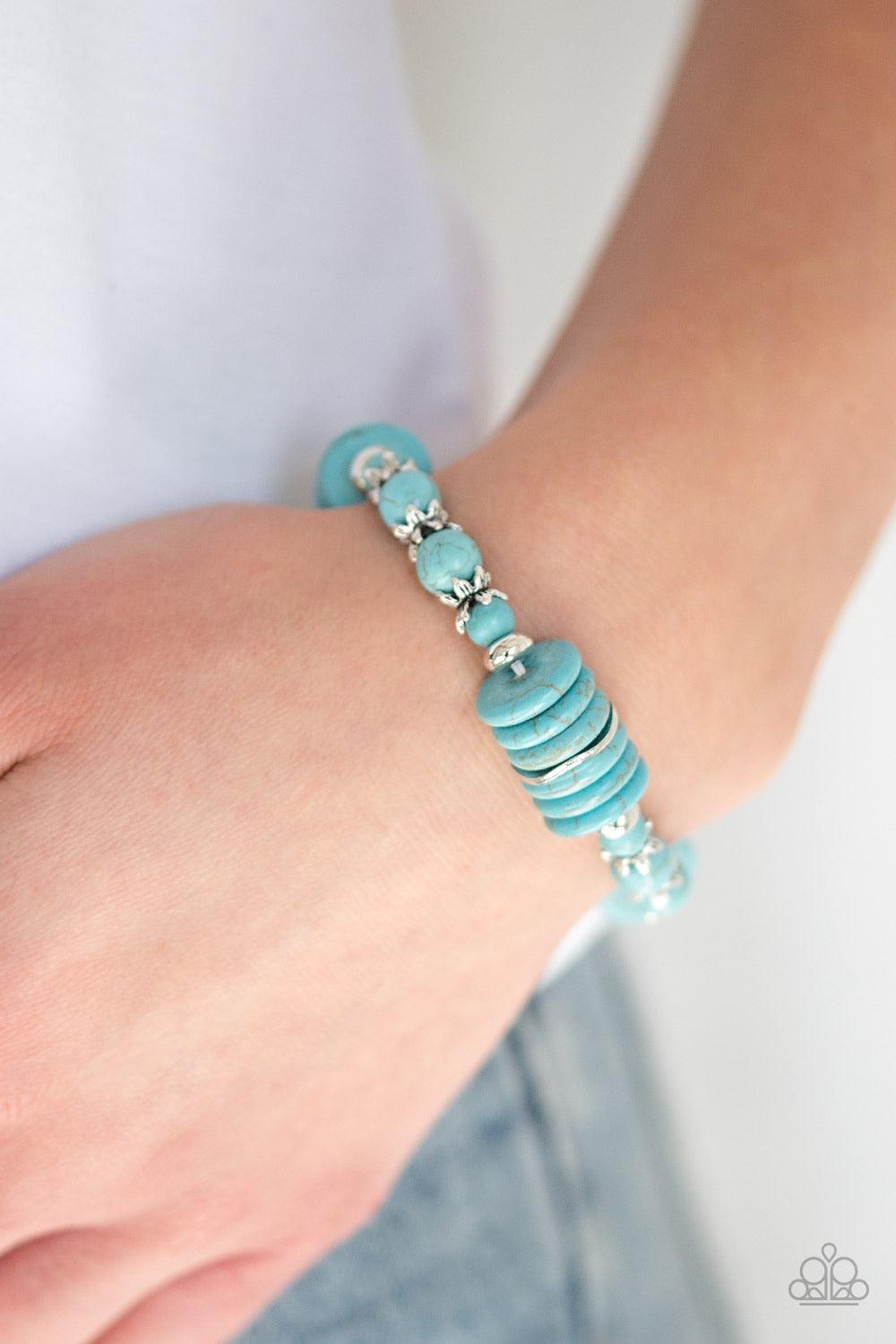Paparazzi Accessories Sagebrush Serenade - Blue Featuring glistening silver accents, refreshing disc-shaped and round turquoise stone beads are threaded along a stretchy band for a seasonal look. Jewelry