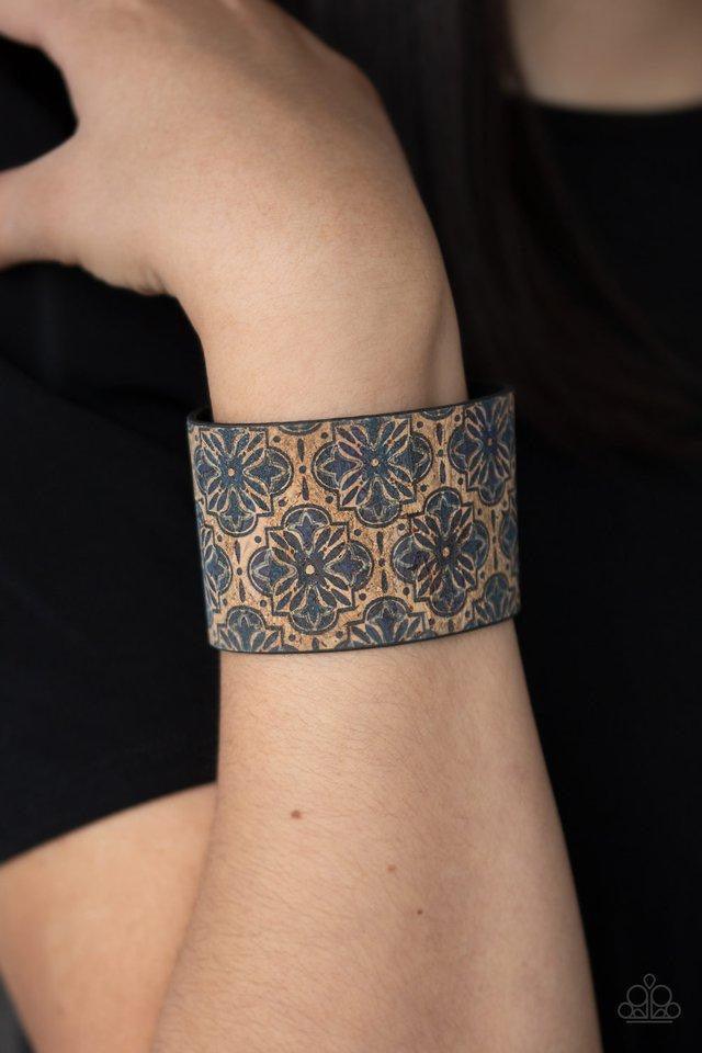 Paparazzi Accessories Cork Culture - Blue Painted in a regal blue floral pattern, a thick cork-like leather band wraps around the wrist for a statement-making look. Features an adjustable snap closure. Sold as one individual bracelet. Jewelry