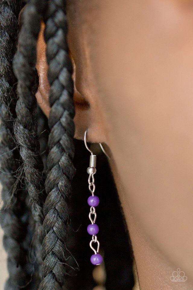 Paparazzi Accessories Harlem Hideaway - Purple Infused with purple beaded tassels, shimmery silver chains stream below the collar, creating a colorful fringe. Features an adjustable clasp closure. Sold as one individual necklace. Includes one pair of matc