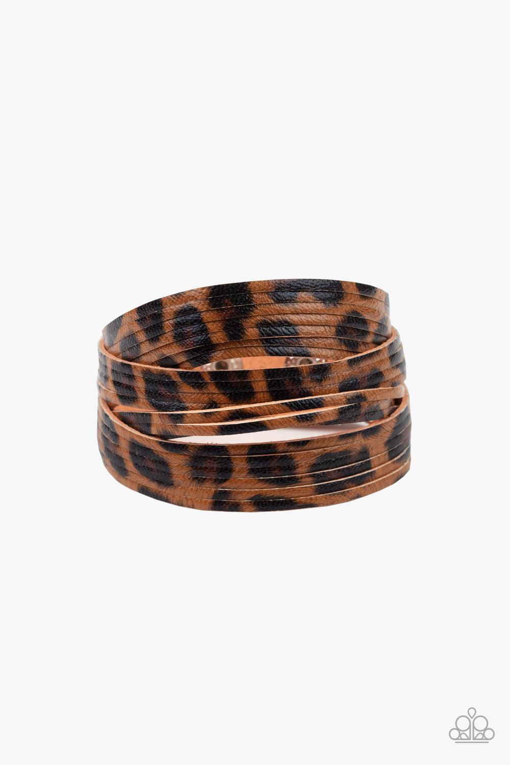 Paparazzi Accessories Hey GRRirl - Brown Painted in a lifelike brown and black cheetah print, thick leather bands have been spliced into layers that wave across the wrist for a wild look. Features an adjustable snap closure. Sold as one individual bracele
