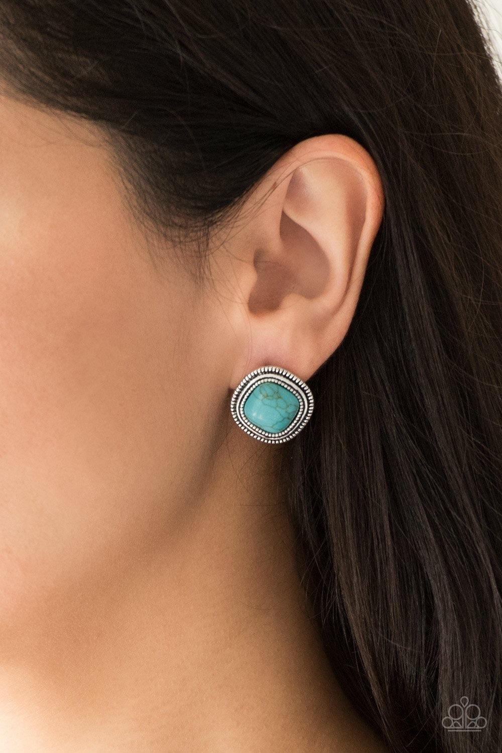 Paparazzi Accessories FRONTIER-Runner - Blue Chiseled into a tranquil square, a refreshing turquoise stone is pressed into a studded silver frame for a seasonal look. Earring attaches to a standard post fitting. Sold as one pair of post earrings. Jewelry