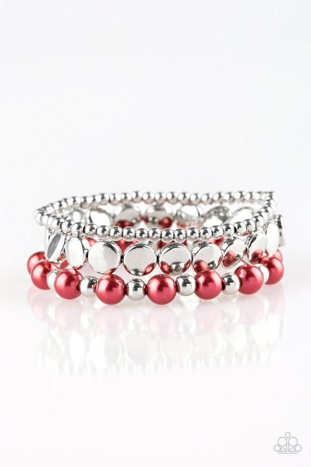 Paparazzi Accessories Girly Girl Glamour - Red Mismatched silver and pearly red beads are threaded along stretchy elastic bands, creating colorful layers across the wrist. Jewelry