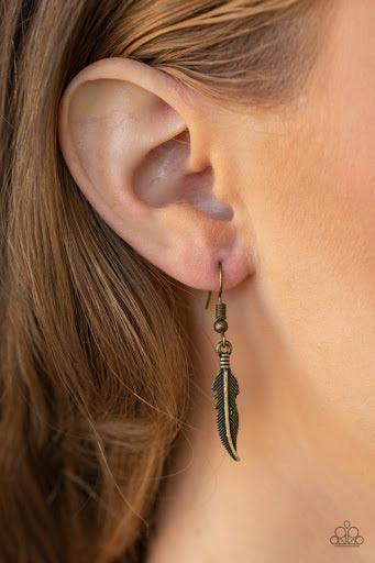 Paparazzi Accessories Feather Forager - Brass Featuring lifelike textures, a glistening brass feather pendant swings from the bottom of a lengthened brass popcorn chain for a seasonal look. Features an adjustable clasp closure. Jewelry