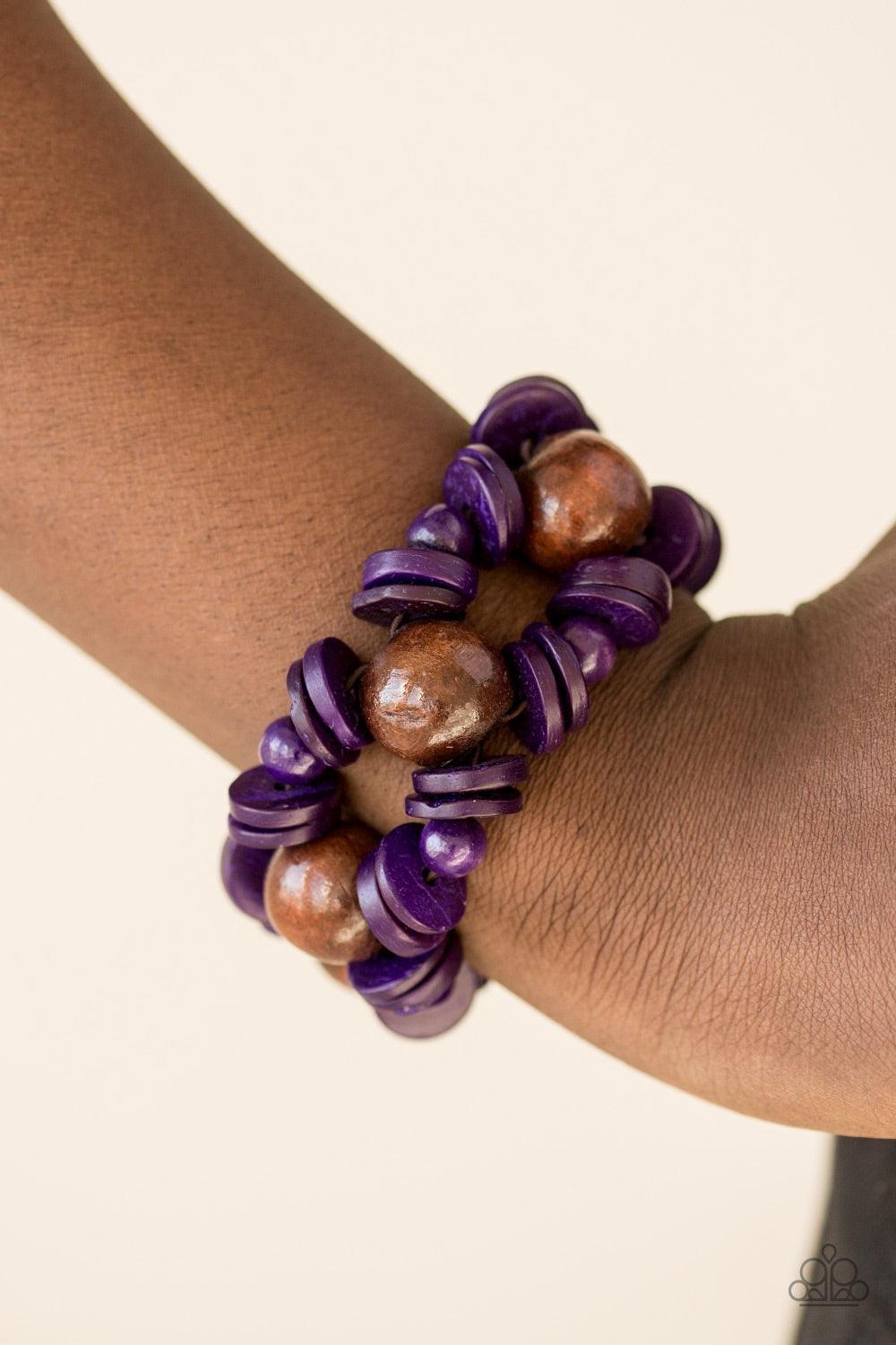 Paparazzi Accessories Fiji Fabulous - Purple Vivacious purple and earthy brown wooden accents are threaded along elastic stretchy bands for a seasonal look. Bracelets