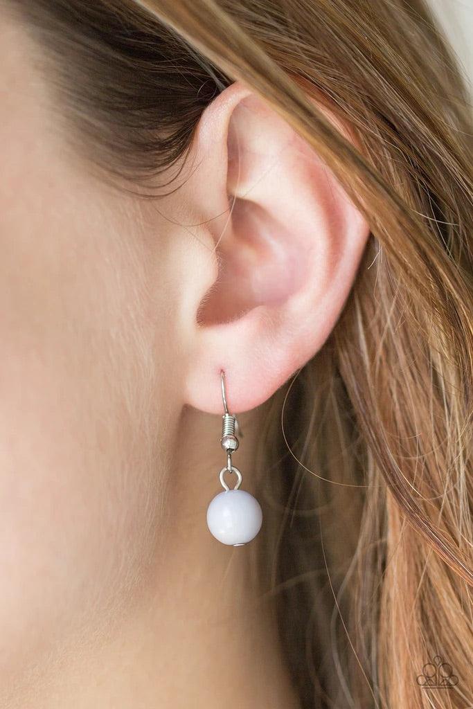 Paparazzi Accessories Summer Showdown - Silver Neutral gray beads and curved silver teardrops swing from the bottom of interlocking silver chains, creating a flirtatious fringe below the collar. Features an adjustable clasp closure. Sold as one individual