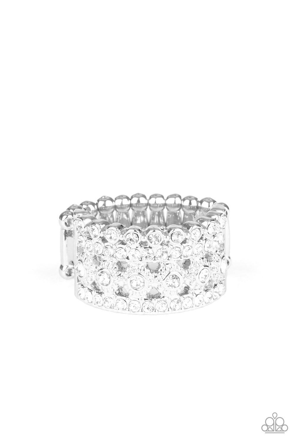 Paparazzi Accessories Countess Couture - White Mismatched bands of glassy white rhinestones layer across the finger, coalescing into a glitzy stacked band. Features a stretchy band for flexible fit. Sold as one individual ring. Jewelry