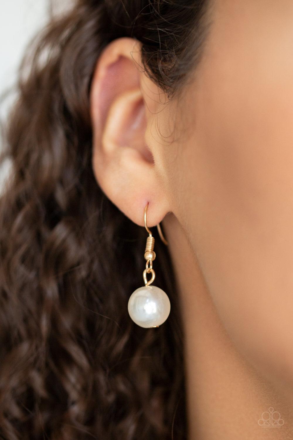 Paparazzi Accessories Empire State Empress - Gold Two strands of dramatic white pearls flank one strand of oversized gold chain, creating statement-making layers below the collar. Features an adjustable clasp closure. Sold as one individual necklace. Incl