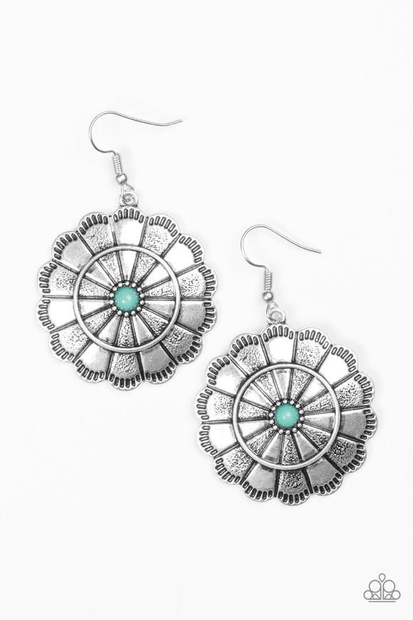 Paparazzi Accessories I’m No Wallflower - Blue Shimmery silver petals bloom from a vivacious blue center for a seasonal look. Etched in serrated edges, alternating petals have been delicately hammered in texture, adding depth and shimmer to the whimsical