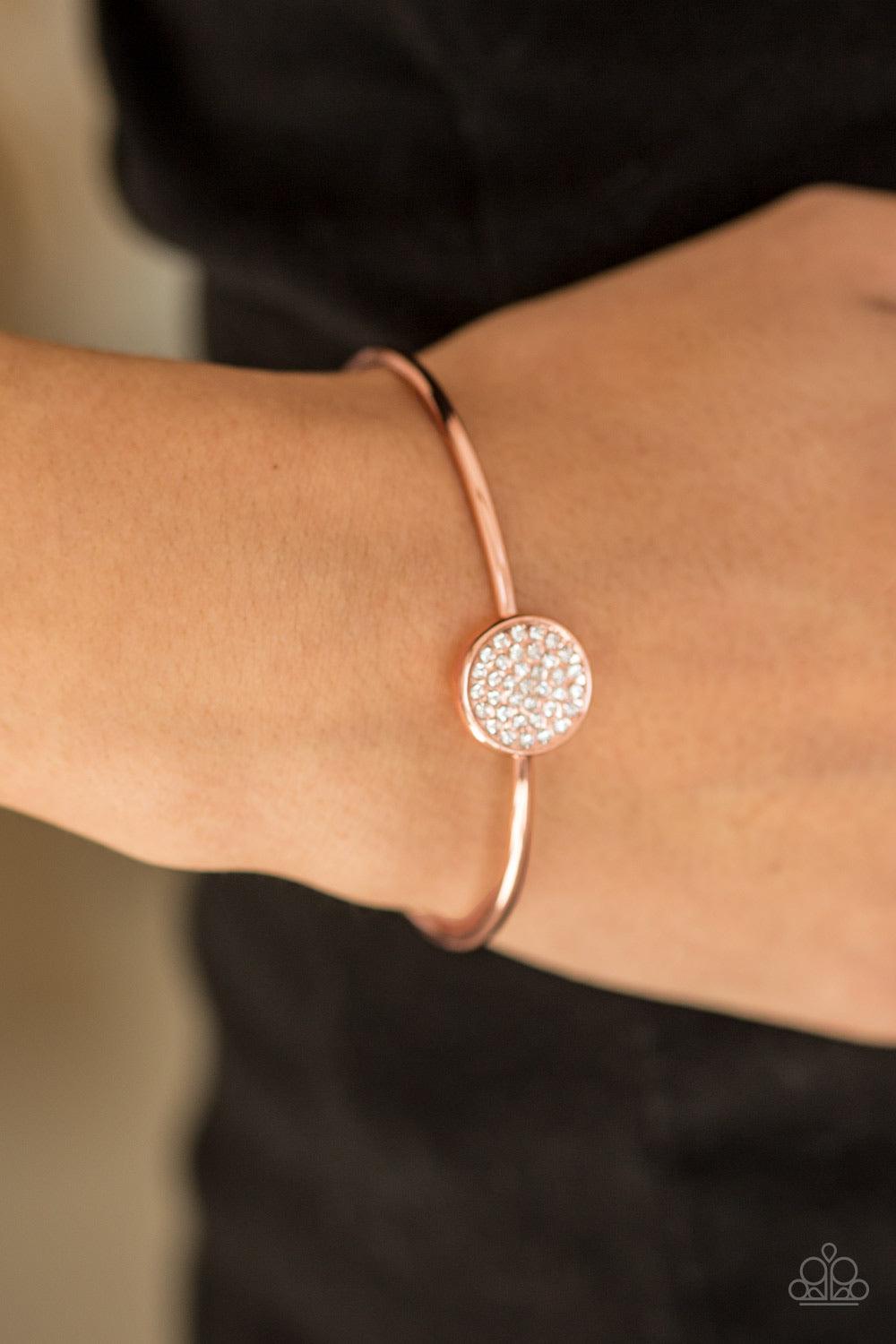 Paparazzi Accessories Modern Day Diva - Copper Encrusted in glassy white rhinestones, a dazzling frame is pressed into the center of a dainty shiny copper cuff for a glamorous look. Sold as one individual bracelet. Jewelry