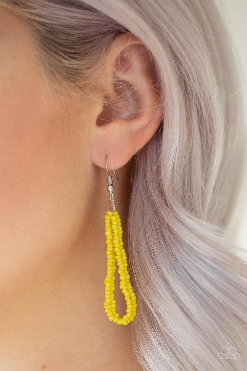 Paparazzi Accessories Let It BEAD - Yellow Countless strands of yellow seed beads drape across the chest in a layered cascade. Accented with classic silver beading, glassy cylindrical beading is added to the display for a radiant finish. Features an adjus