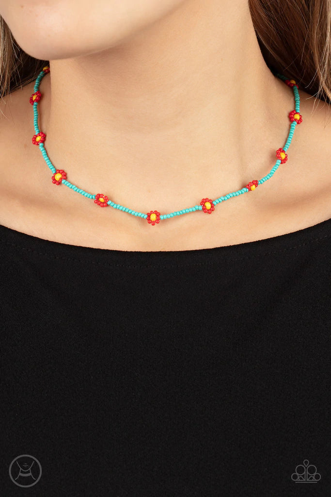 Paparazzi Accessories Colorfully Flower Child - Blue A dainty strand of turquoise seed beads is dotted with red and yellow beaded floral frames, creating a flirtatious floral look around the neck. Features an adjustable clasp closure. Sold as one individu