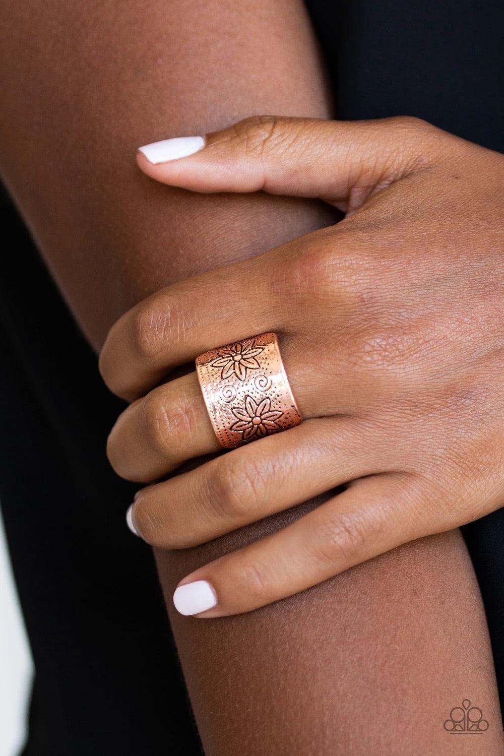 Paparazzi Accessories Wild Meadows - Copper Stamped in floral detail, a thick copper band arcs across the finger for a seasonal look. Features a stretchy band for a flexible fit. Sold as one individual ring. Jewelry