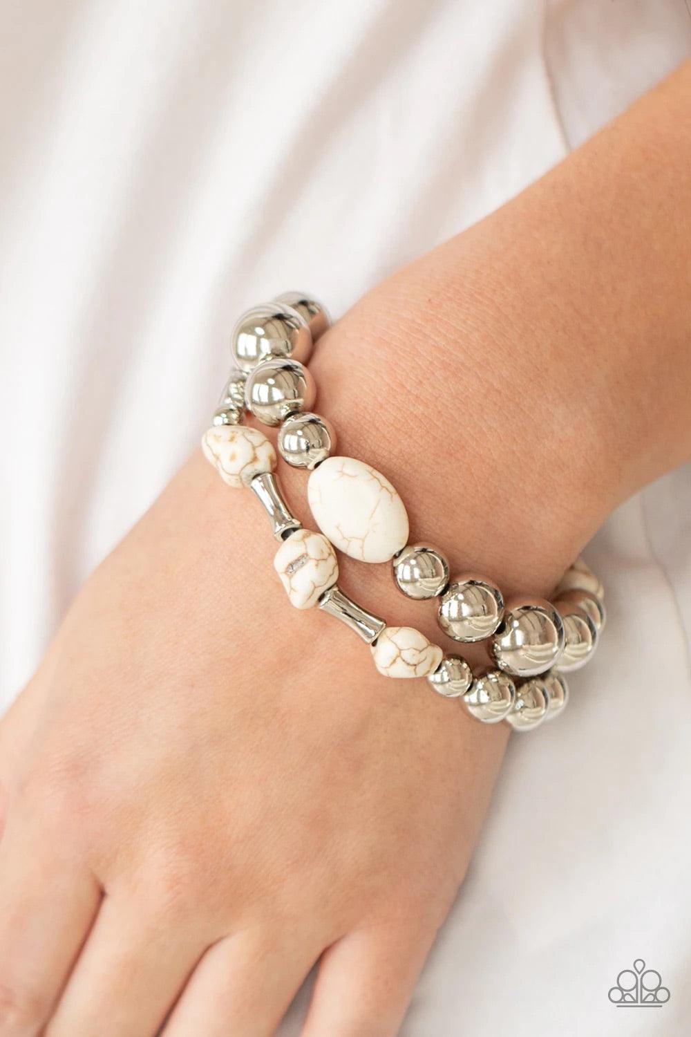 Paparazzi Accessories Authentically Artisan - White Mismatched white stones and oversized silver beads are threaded along stretchy bands around the wrist, creating earthy layers. Sold as one pair of bracelets. Jewelry