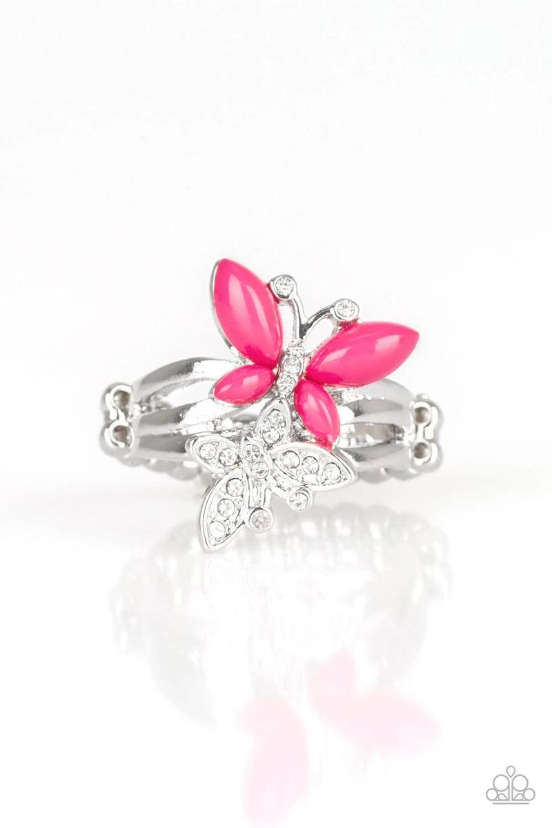 Paparazzi Accessories Flutter Flirt ~Pink Infused with dainty white rhinestones, a pink beaded butterfly joins a white rhinestone encrusted butterfly atop stacked silver bands for a whimsical fashion. Features a dainty stretchy band for a flexible fit. So
