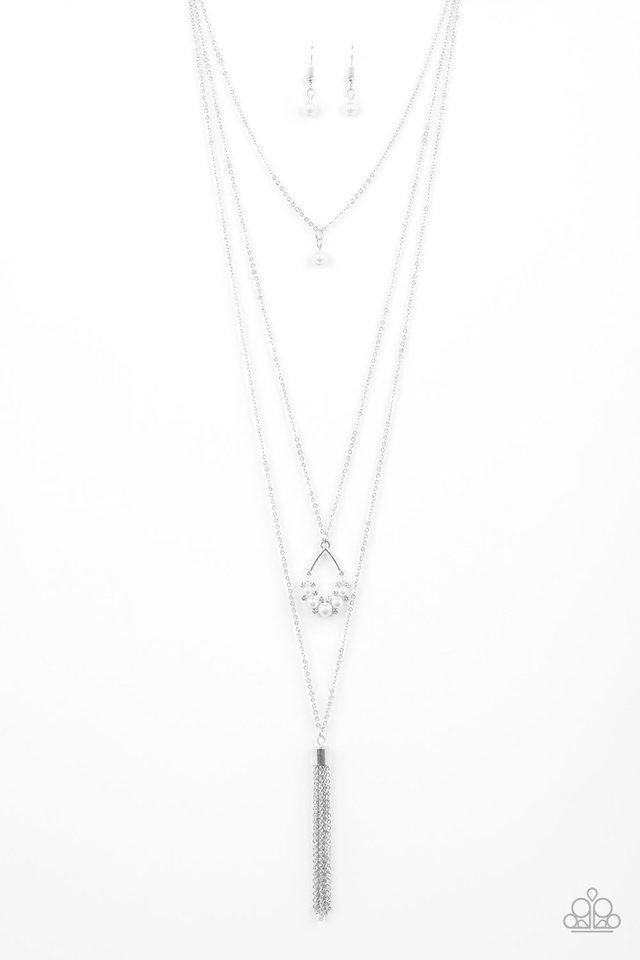 Paparazzi Accessories Be Fancy - White A solitaire white pearl swings from the uppermost chain, giving way to a teardrop pendant and shimmery silver chain tassel. Dainty white rhinestones and white pearls collect at the bottom of the centermost pendant fo