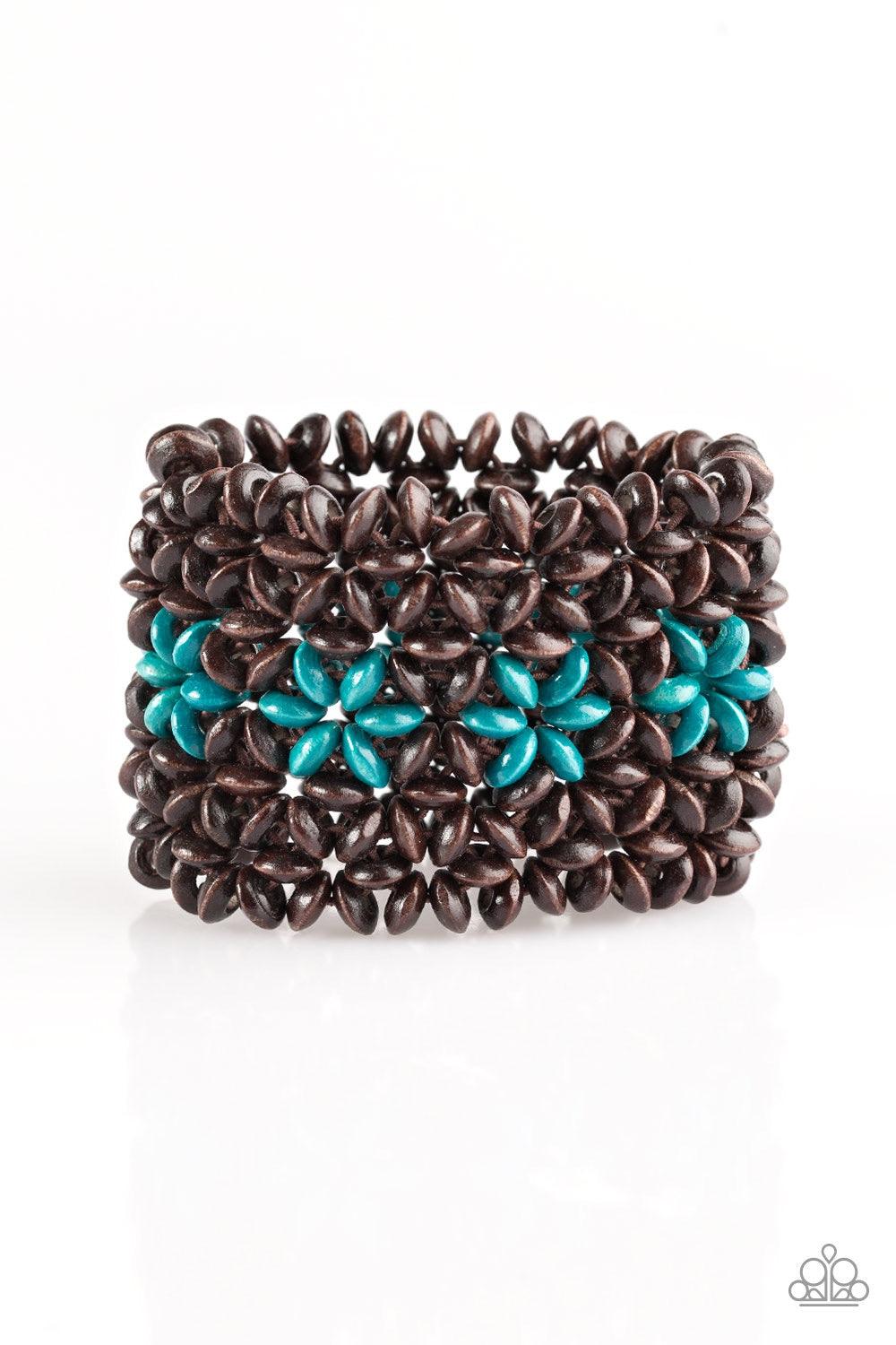 Paparazzi Accessories Bahama Babe - Blue Earthy wooden accents are threaded along elastic stretchy bands, creating an ornate bracelet. Tinted in a refreshing finish, blue wooden beads gather down the center, creating summery floral accents for a colorful