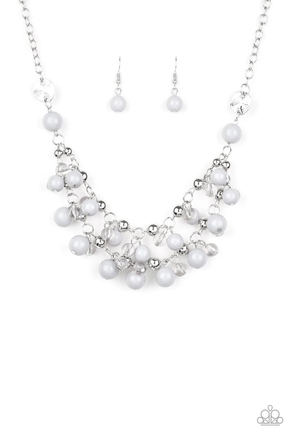 Paparazzi Accessories Seaside Soirée - White Hammered silver discs give way to layers of polished gray, glassy, and shiny silver beads. The colorful collection layers below the collar, creating a bubbly fringe. Features an adjustable clasp closure. Sold a