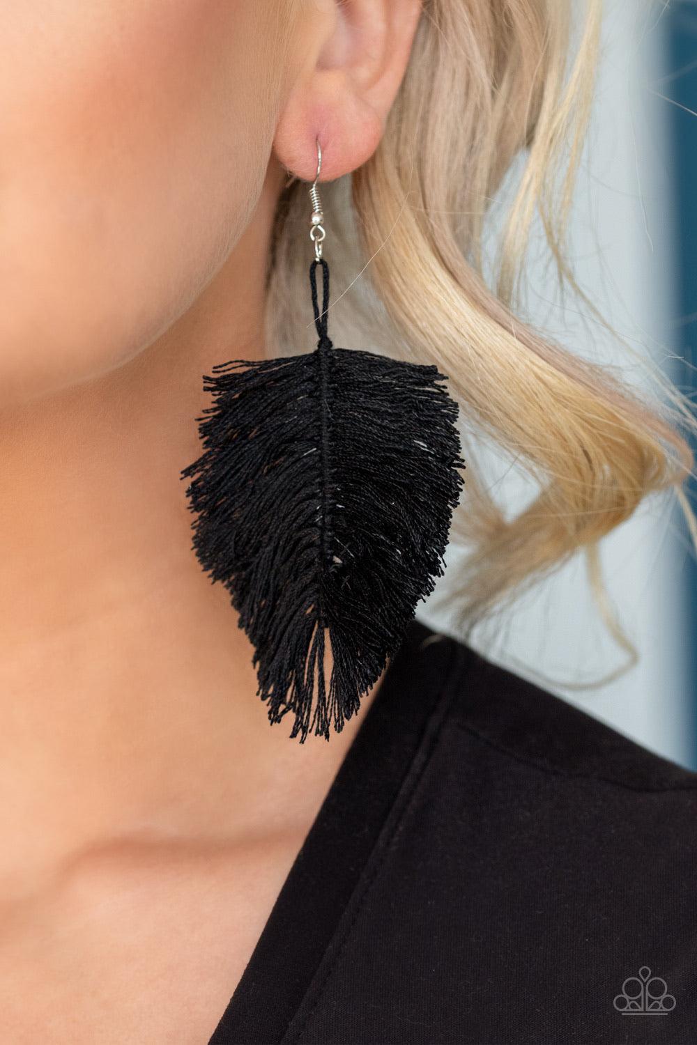 Paparazzi Accessories Hanging By A Thread - Black Featuring a shiny black hue, a loop of thread gives way to a leafy black fringe, creating a statement-making texture. Earring attaches to a standard fishhook fitting. Sold as one pair of earrings. Jewelry