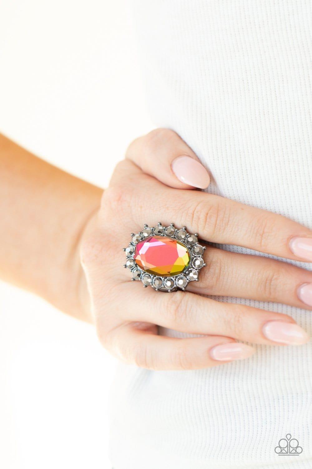 Paparazzi Accessories Bling Of All Bling -Multi Hematite rhinestone encrusted petals bloom from an oversized oil spill gem, creating a dramatic centerpiece atop the finger. Features a stretchy band for a flexible fit. Sold as one individual ring. Jewelry
