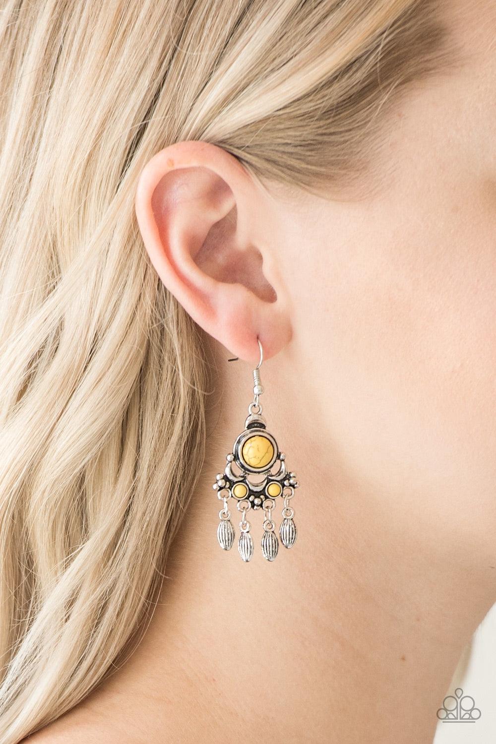 Paparazzi Accessories No Place Like HOMESTEAD - Yellow Dotted with sunny yellow stone accents, an ornate silver frame gives way to a silver beaded fringe for a seasonal look. Earring attaches to a standard fishhook fitting. Jewelry