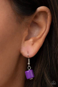 Paparazzi Accessories Tranquil Trendsetter - Purple Featuring the bold hues of Ultimate Gray and purple, mismatched acrylic and faux rock beads are haphazardly threaded along an invisible wire below the collar for an abstract artisan vibe. Features an adj