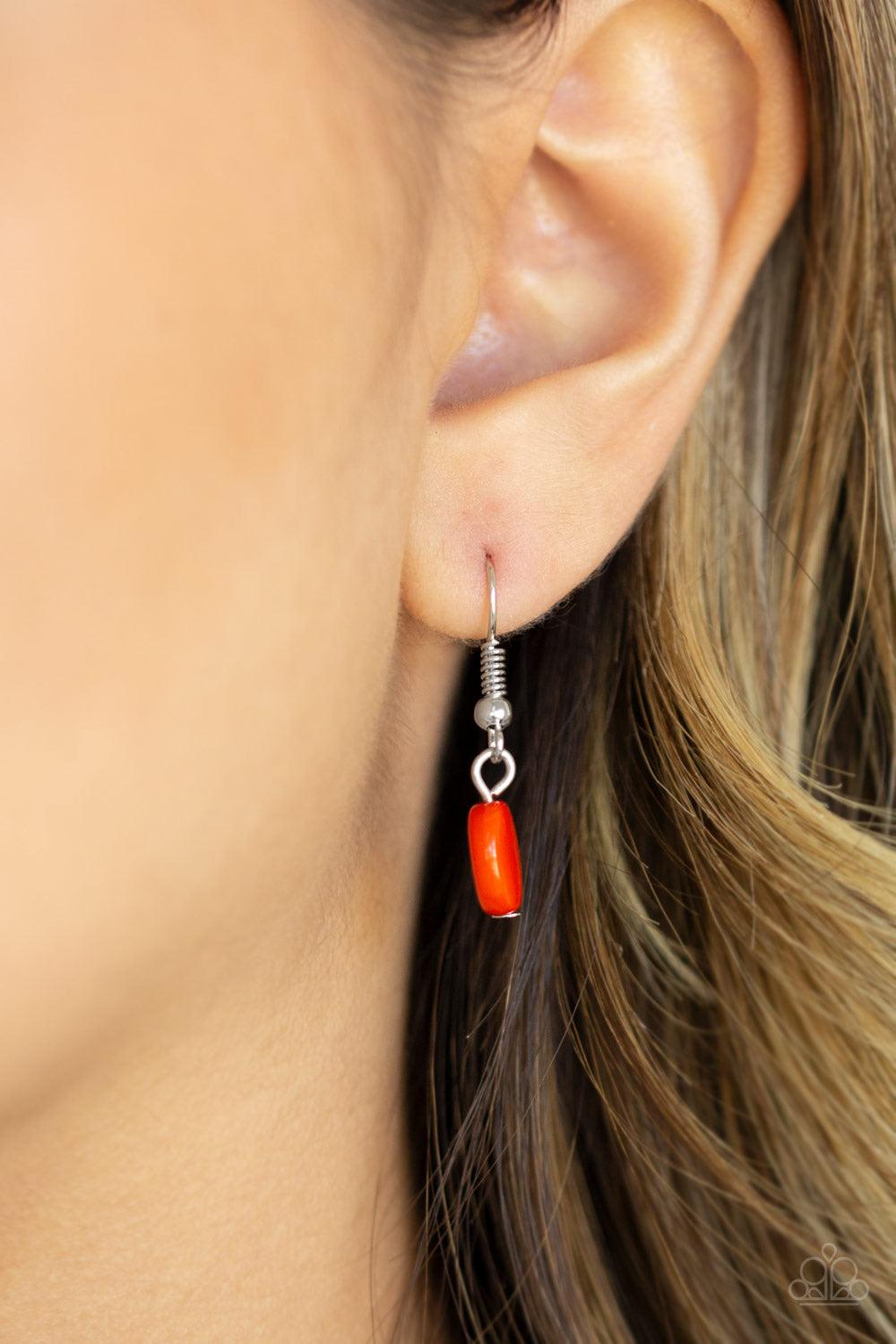 Paparazzi Accessories The Medallion-aire - Orange Flat orange beads connect with shimmery silver floral frames below the collar, creating a colorful medallion-like statement piece with a vintage inflection. Features an adjustable clasp closure. Jewelry
