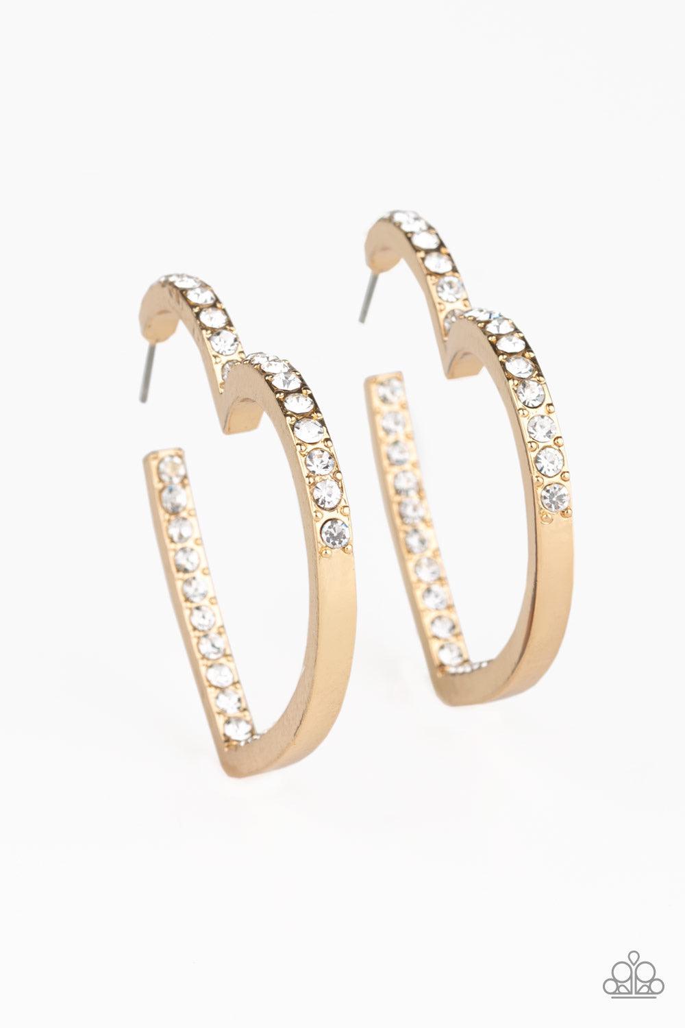 Paparazzi Accessories Heartbreaker - Gold Encrusted in sections of glittery white rhinestones, a glistening gold hoop curls into a charming heart shape for a heart-stopping look. Earring attaches to a standard post fitting. Hoop measures approximately 2"