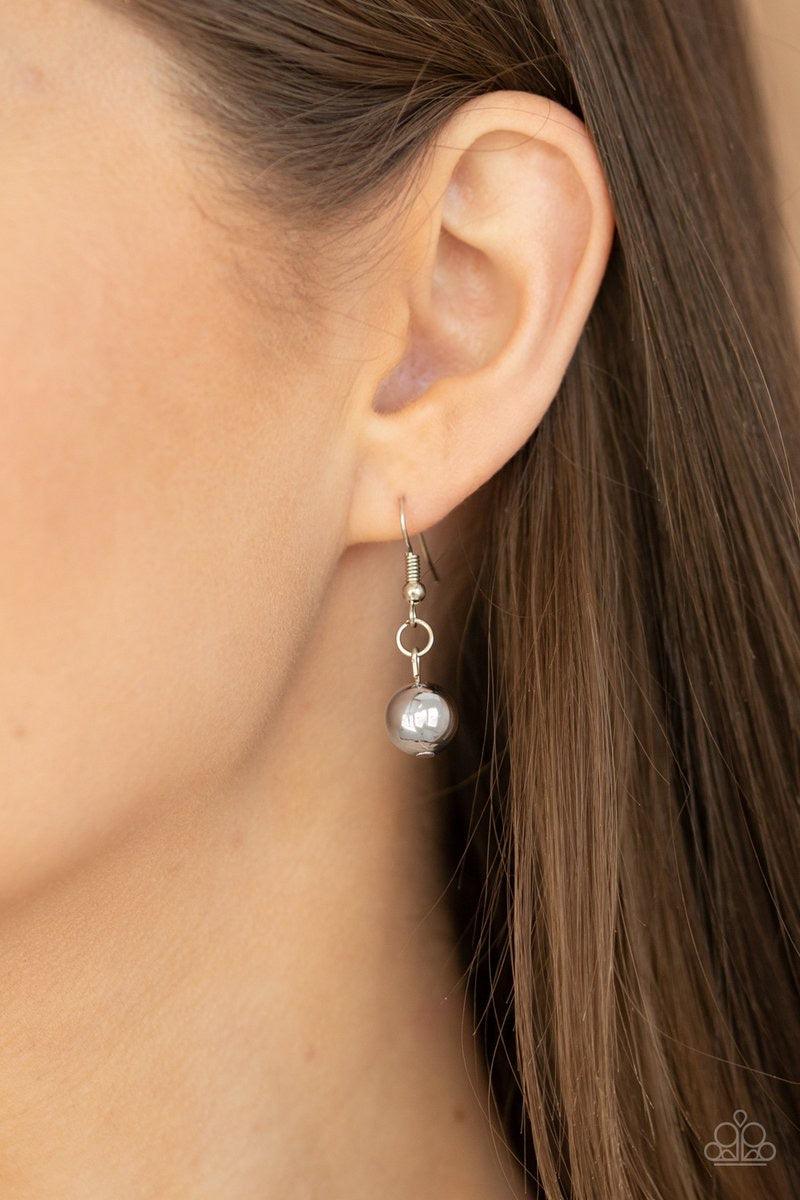 Paparazzi Accessories Hand-Knotted Knockout - White Hand-Knotted Knockout White – Paparazzi Necklace. Shiny silver beads are knotted in place along strands of white cording that have been knotted into an edgy tassel at the bottom of matching lengthened co