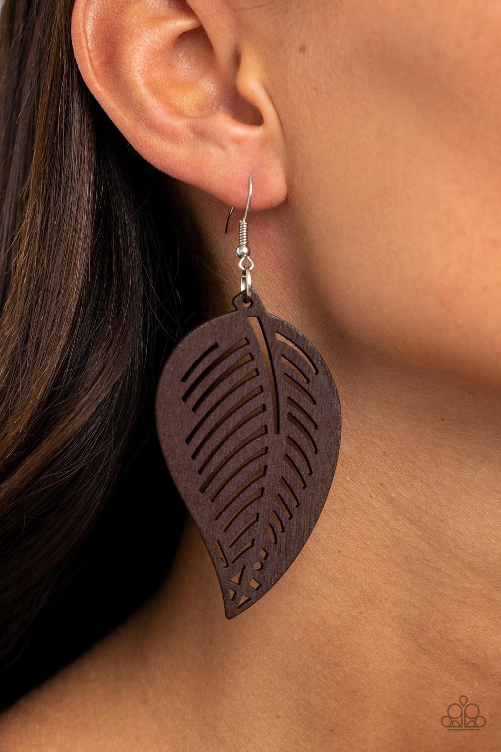 Paparazzi Accessories Tropical Foliage - Brown Brushed in a neutral brown finish, a wooden frame is delicately cut into an airy leaf pattern for a seasonal flair. Earring attaches to a standard fishhook fitting. Sold as one pair of earrings. Jewelry