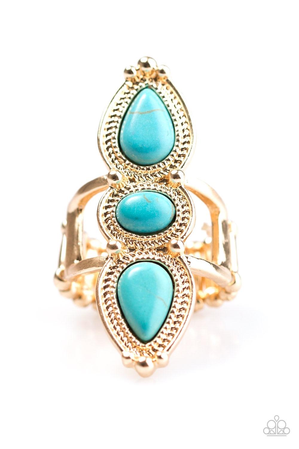 Paparazzi Accessories Calling All Chiefs - Gold Refreshing turquoise stone beads are pressed into an elongated gold frame. Dotted with gold studs and embossed in stunning rope-like textures, the dramatic frame extends down the finger in a simply seasonal