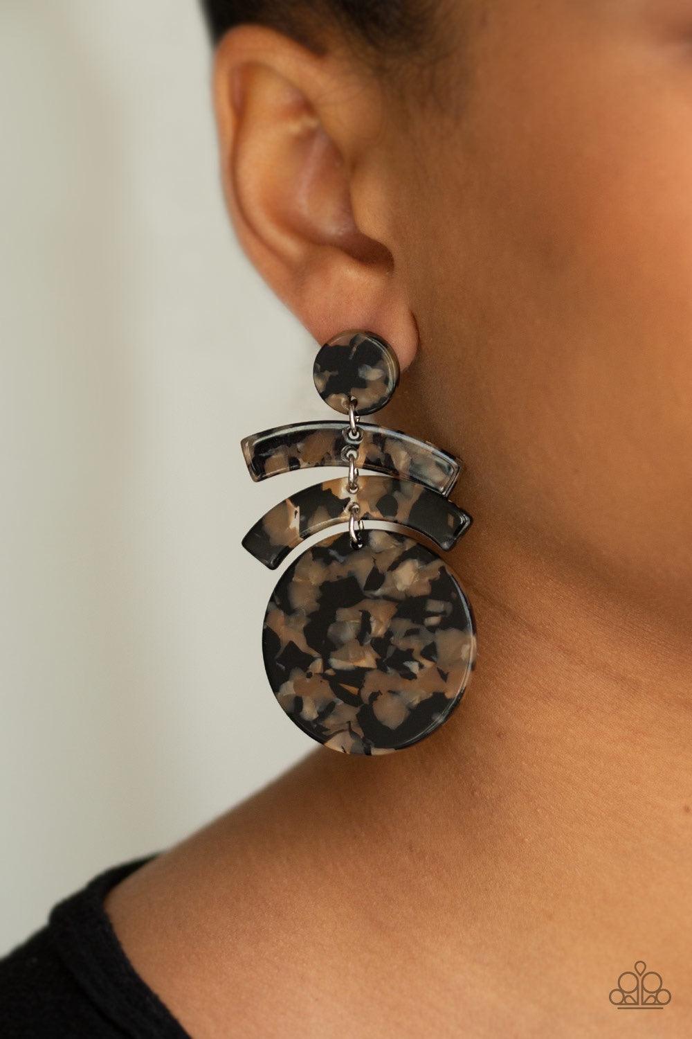 Paparazzi Accessories In The HAUTE Seat - Black Featuring a faux-marble finish, shiny acrylic frames link into an abstract lure for a retro look. Earring attaches to a standard post fitting. Jewelry