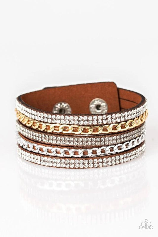 Paparazzi Accessories Fashion Fiend - Brown Glassy white and smoky rhinestones are encrusted along strands of brown suede. Glistening silver and gold chains are added to the bands, adding edgy industrial shimmer to the sassy palette. Features an adjustabl