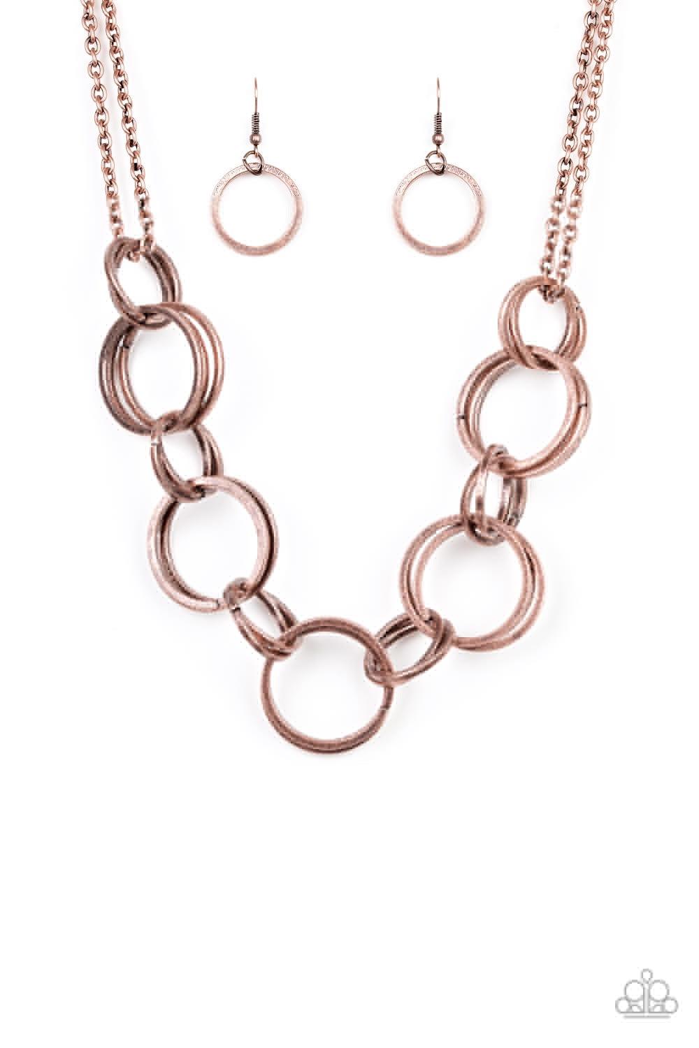 Paparazzi Accessories Jump Into The Ring - Copper Brushed in an antiqued shimmer, doubled and tripled copper hoops link below the collar for a bold industrial look. Features an adjustable clasp closure. Jewelry