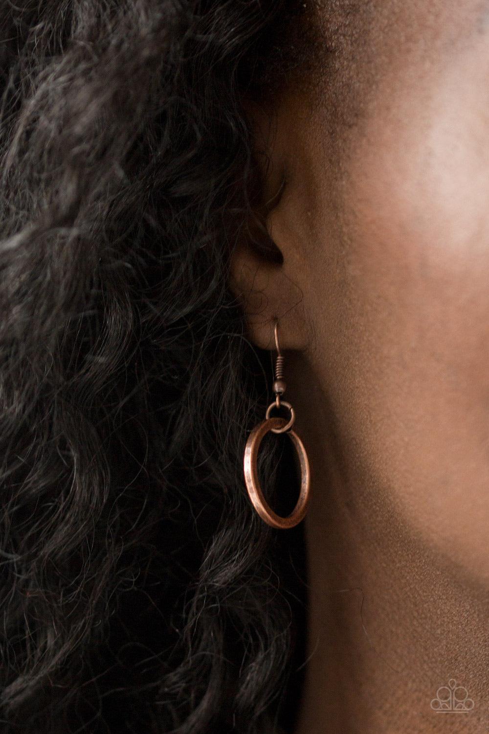 Paparazzi Accessories Jump Into The Ring - Copper Brushed in an antiqued shimmer, doubled and tripled copper hoops link below the collar for a bold industrial look. Features an adjustable clasp closure. Jewelry
