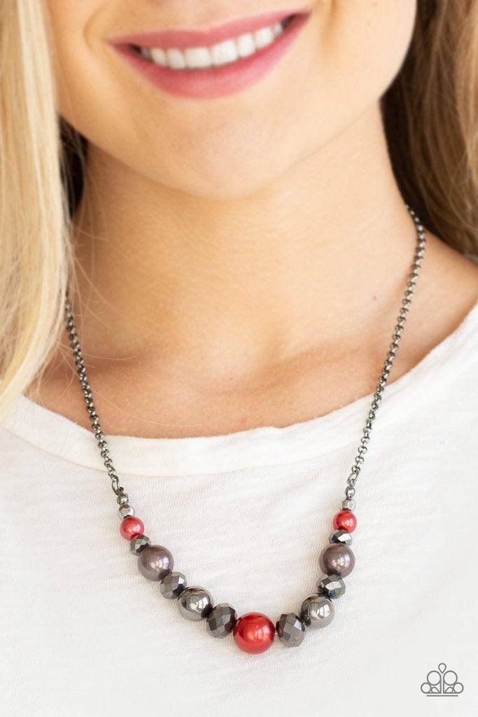 Paparazzi Accessories The Big-Leaguer - Multi A collection of pearly red, classic gunmetal, and crystal-like hematite beads are threaded along an invisible wire below the collar for a glamorous look. Features an adjustable clasp closure. Sold as one indiv