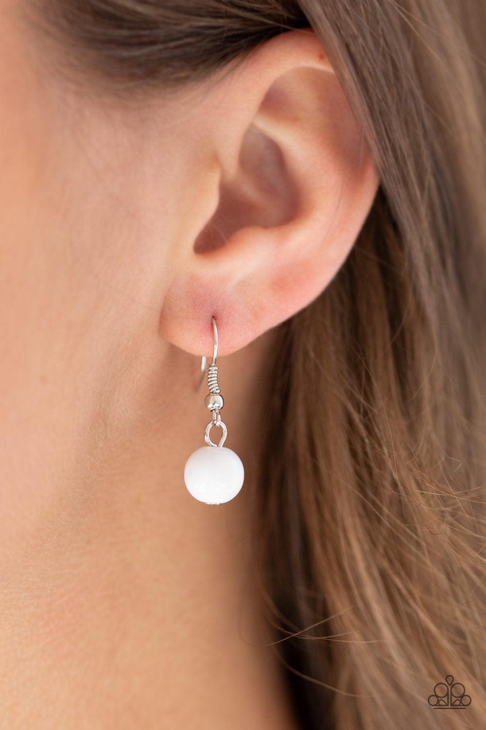 Paparazzi Accessories Sundae Shoppe - White A collection of glassy, polished, and cloudy white beads are threaded along two invisible wires below the collar for a beautiful pop of color. Features an adjustable clasp closure. Jewelry
