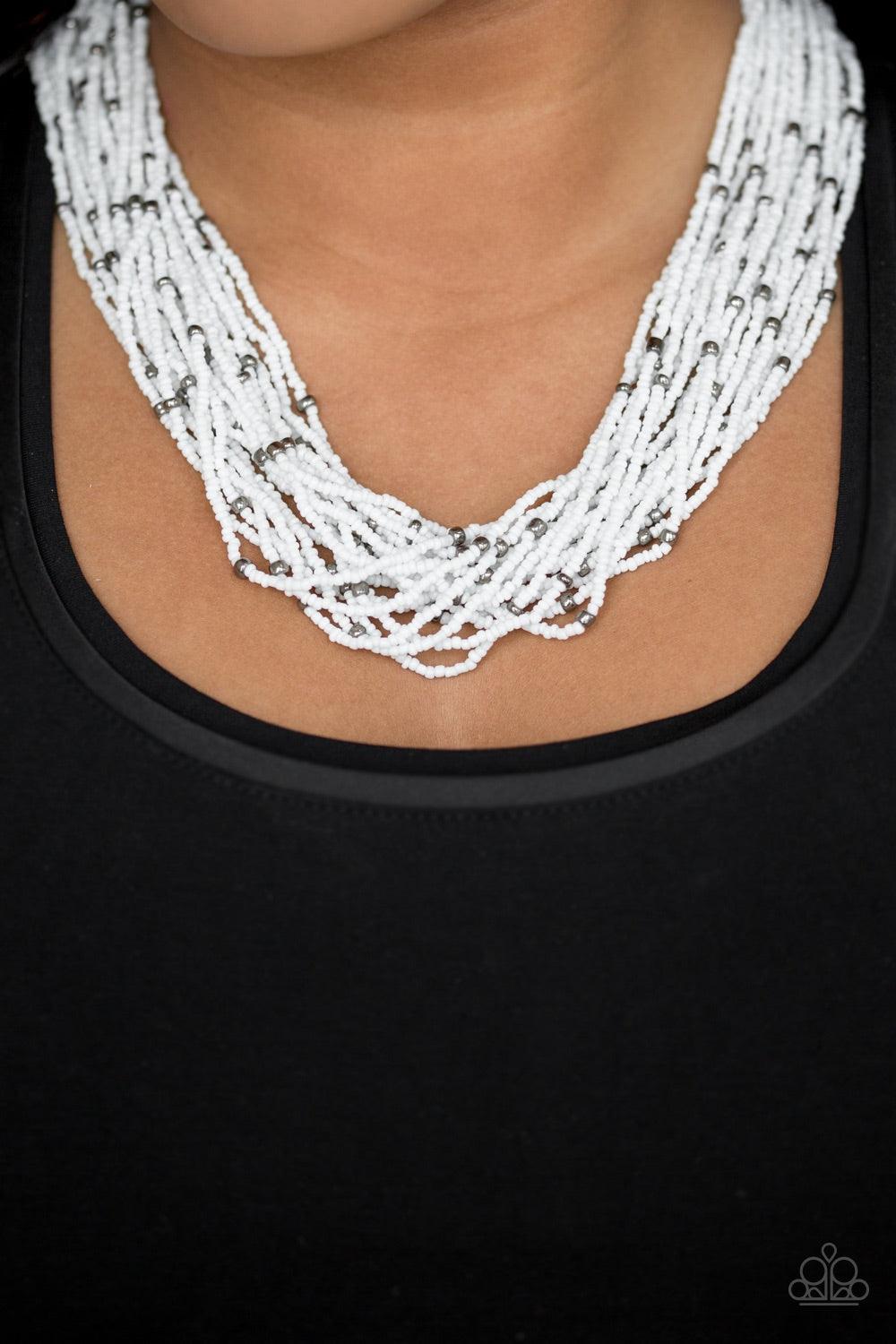 Paparazzi Accessories Summer Samba - White Countless white seed beads drape into a gorgeous layered cascade below the collar. Dainty metallic accents are sprinkled between the colorful beads, adding irresistible hints of shimmer to the seasonal palette. F
