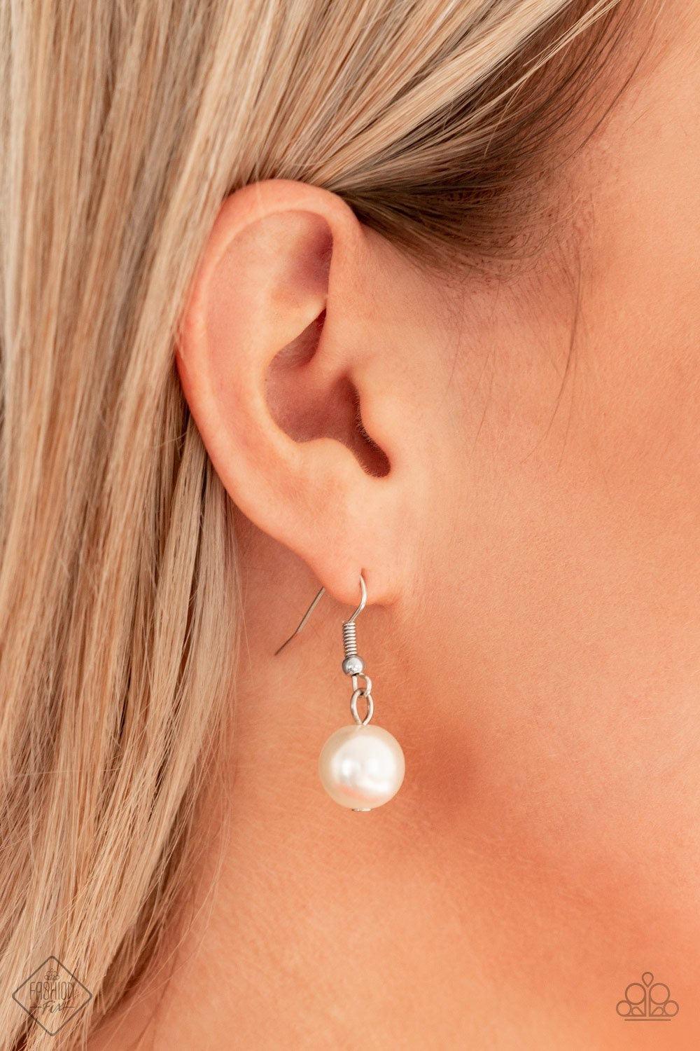 Paparazzi Accessories One-Way Wallstreet - White A collision of mismatched silver chains layer below the collar. Over sized white pearls dangle from the lowermost chain, creating a dramatically refined fringe for a statement-making finish. Features an adj