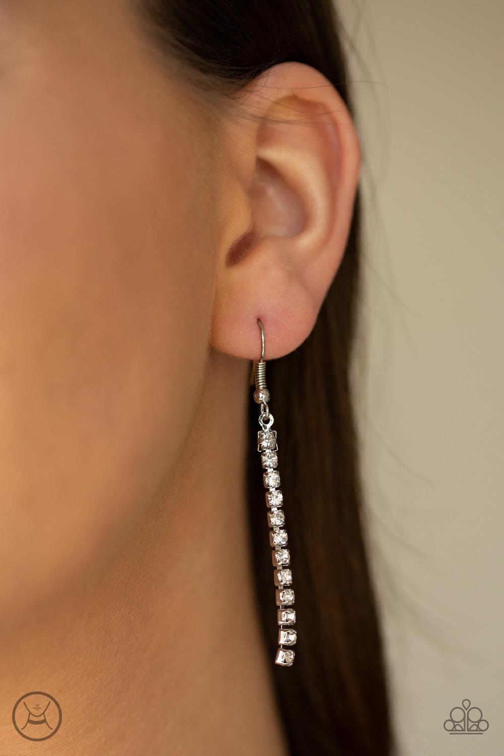 Paparazzi Accessories Empower-HER-ment - White Featuring sleek square fittings, strands of glittery white rhinestones flank a glistening silver chain, coalescing into a regal look around the neck. Features an adjustable clasp closure. Jewelry