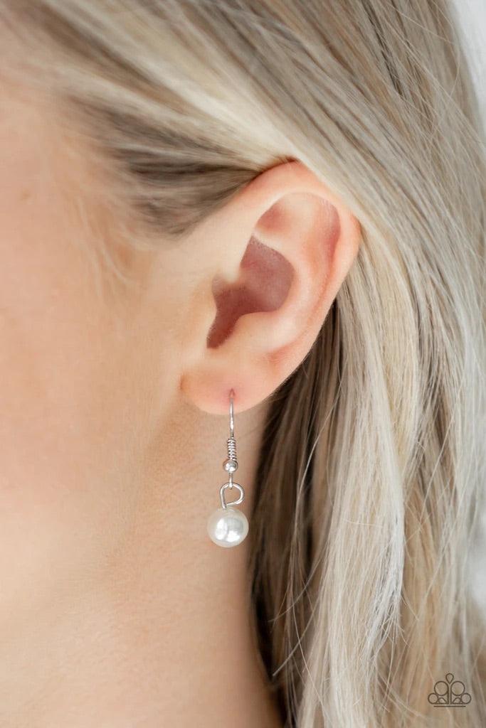 Paparazzi Accessories High Heels and Hustle - White A trio of pearly white beads give way to layers of solitaire white pearl pendants below the collar for a refined flair. Features an adjustable clasp closure. Sold as one individual necklace. Includes one
