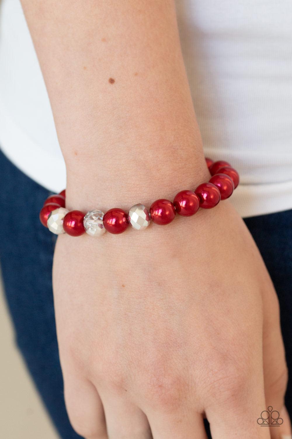 Paparazzi Accessories Really Resplendent - Red Infused with three metallic crystal-like beads, a refined collection of red pearls is threaded along a stretchy band around the wrist in a timeless fashion. Jewelry
