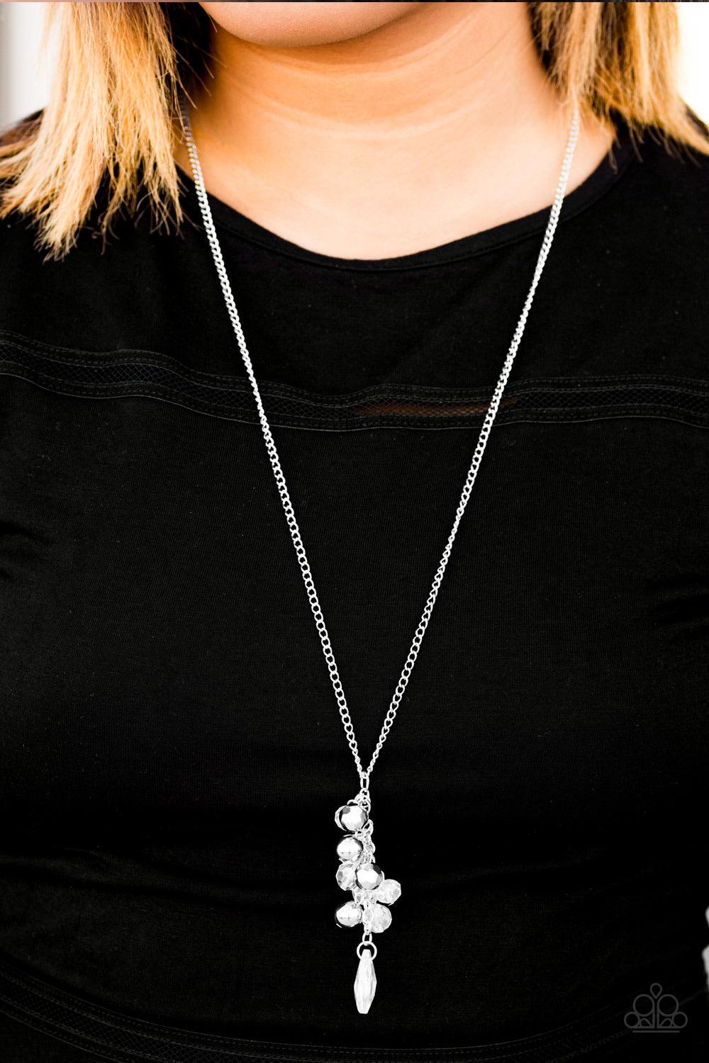 Paparazzi Accessories Somewhere Over The Glitter RAINBOW - White Faceted white, silver, and iridescent crystal beads trickle from the bottom of a lengthened silver chain, creating a clustered pendant. Infused with classic silver beads, a faceted white tea