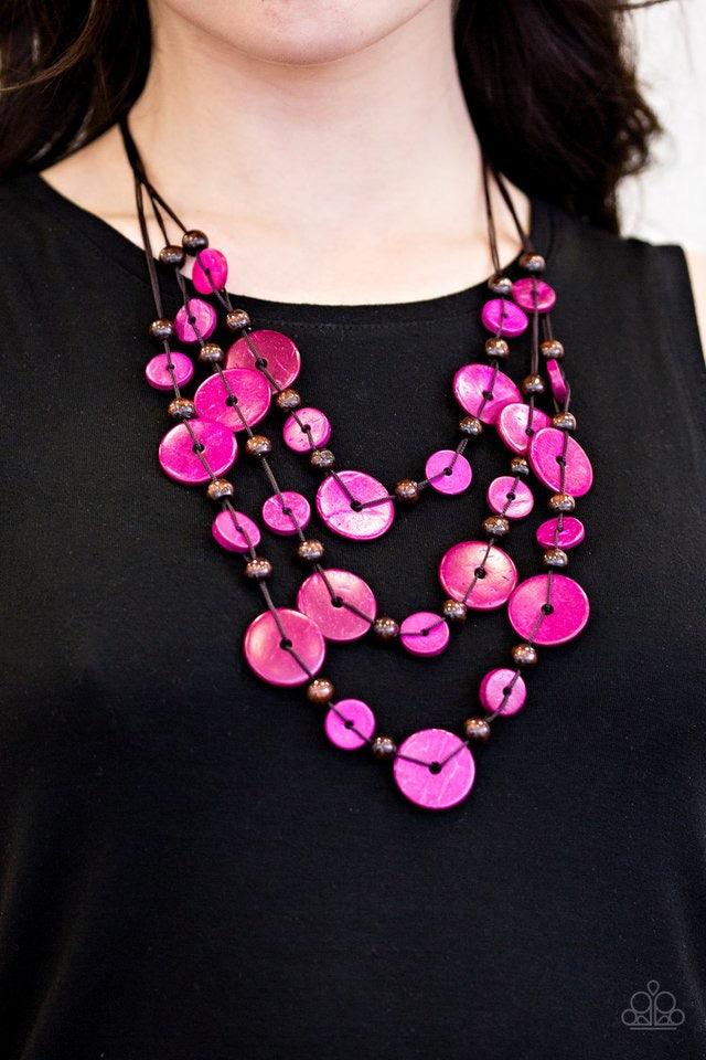 Paparazzi Accessories South Beach Summer - Pink Brushed in a distressed finish, vivacious pink and brown wooden beads trickle along three strands, creating a summery look down the chest. Features a button loop closure. Jewelry