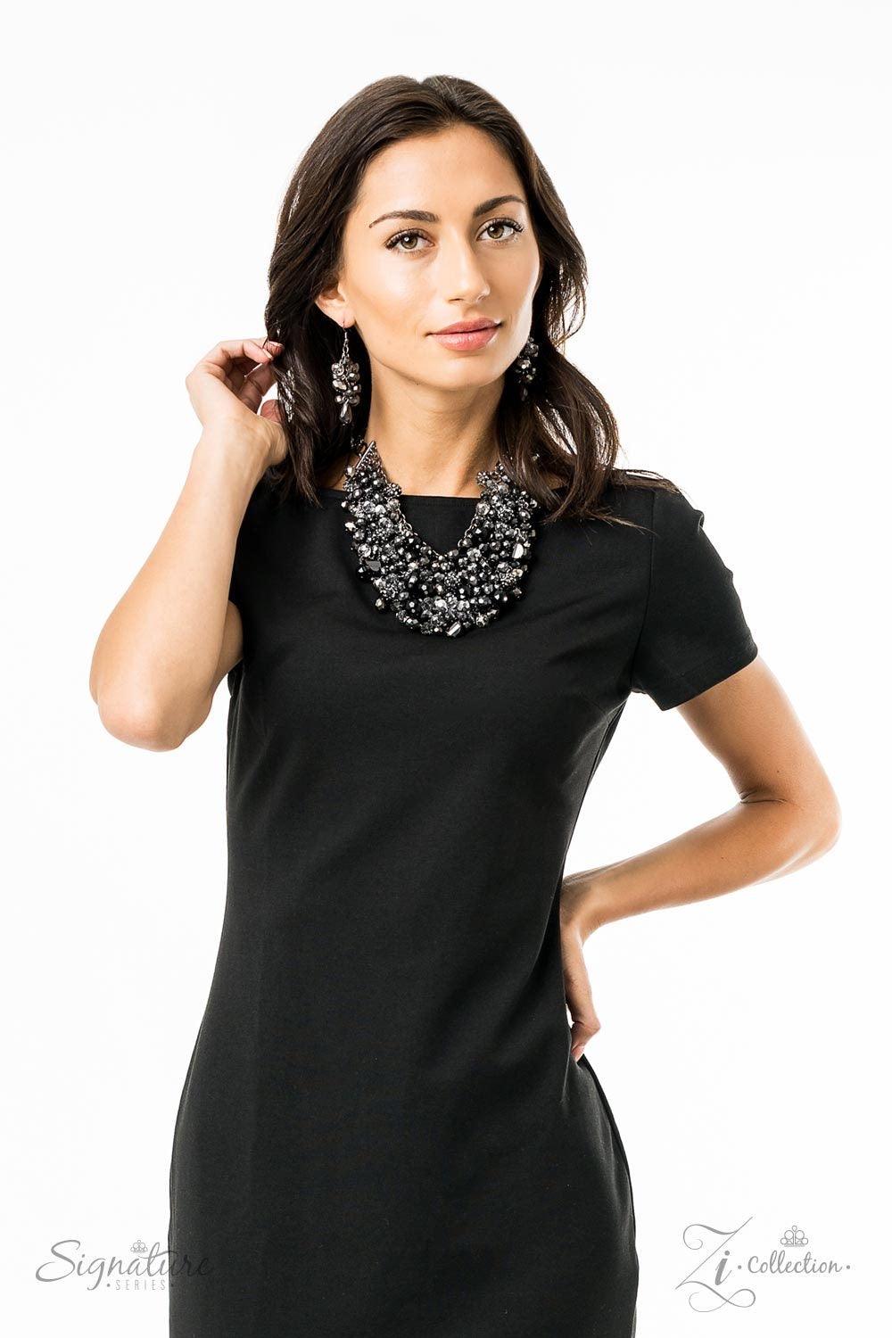 Paparazzi Accessories The Taylerlee 💗ZiCollection $25💗 A collision of faceted crystal, hematite, and gem-like beading dangles from stacked rows of interconnecting gunmetal chains, creating a meshed fringe. Encrusted in prismatic hematite rhinestones, bl