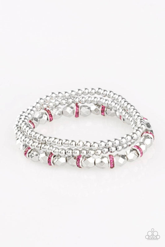 Paparazzi Accessories Let There BEAM Light - Pink Infused with pink rhinestone encrusted rings, mismatched dainty silver and faceted silver beads are threaded along stretchy bands for a refined look. Shiny and pink you cant go wrong with this adorable sta