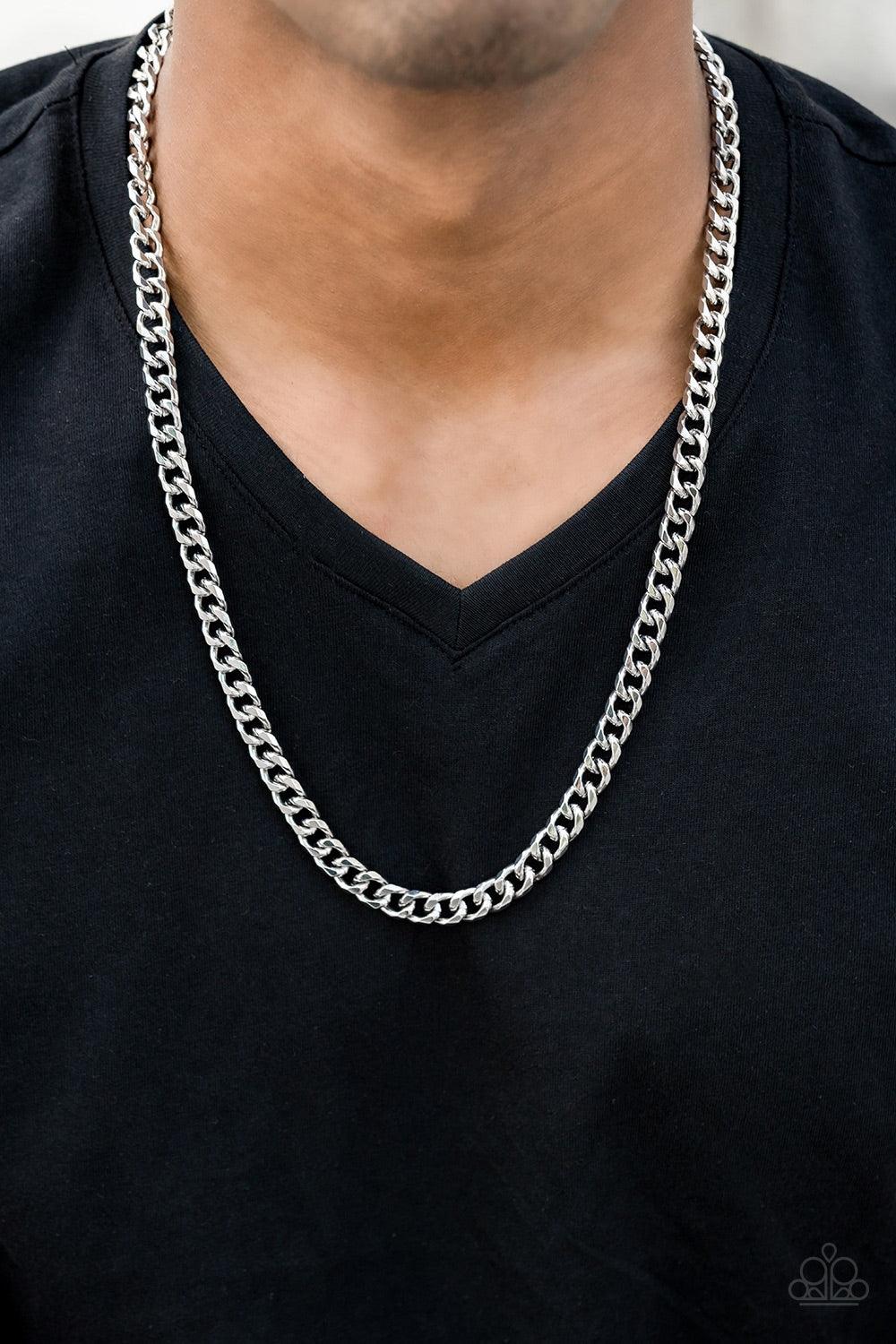 Paparazzi Accessories The Game CHAIN-ger - Silver Featuring classic curb link chain, a thick silver chain drapes across the chest for a game changing look. Features an adjustable clasp closure. Jewelry