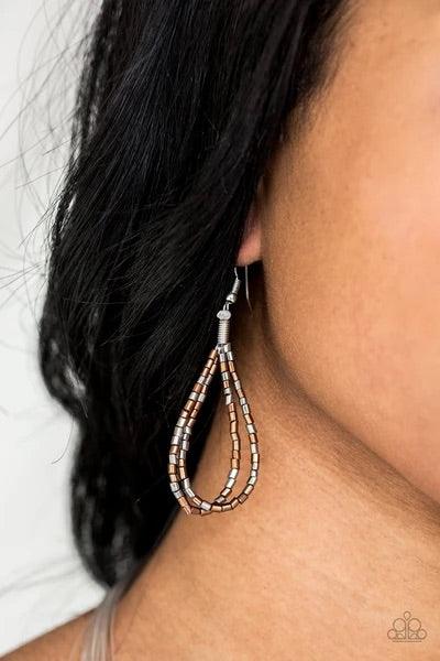 Paparazzi Accessories Catwalk Queen - Multi Strand after strand of metallic copper and gunmetal seed beads fall together to create a bold statement piece. Features an adjustable clasp closure. Sold as one individual necklace. Includes one pair of matching