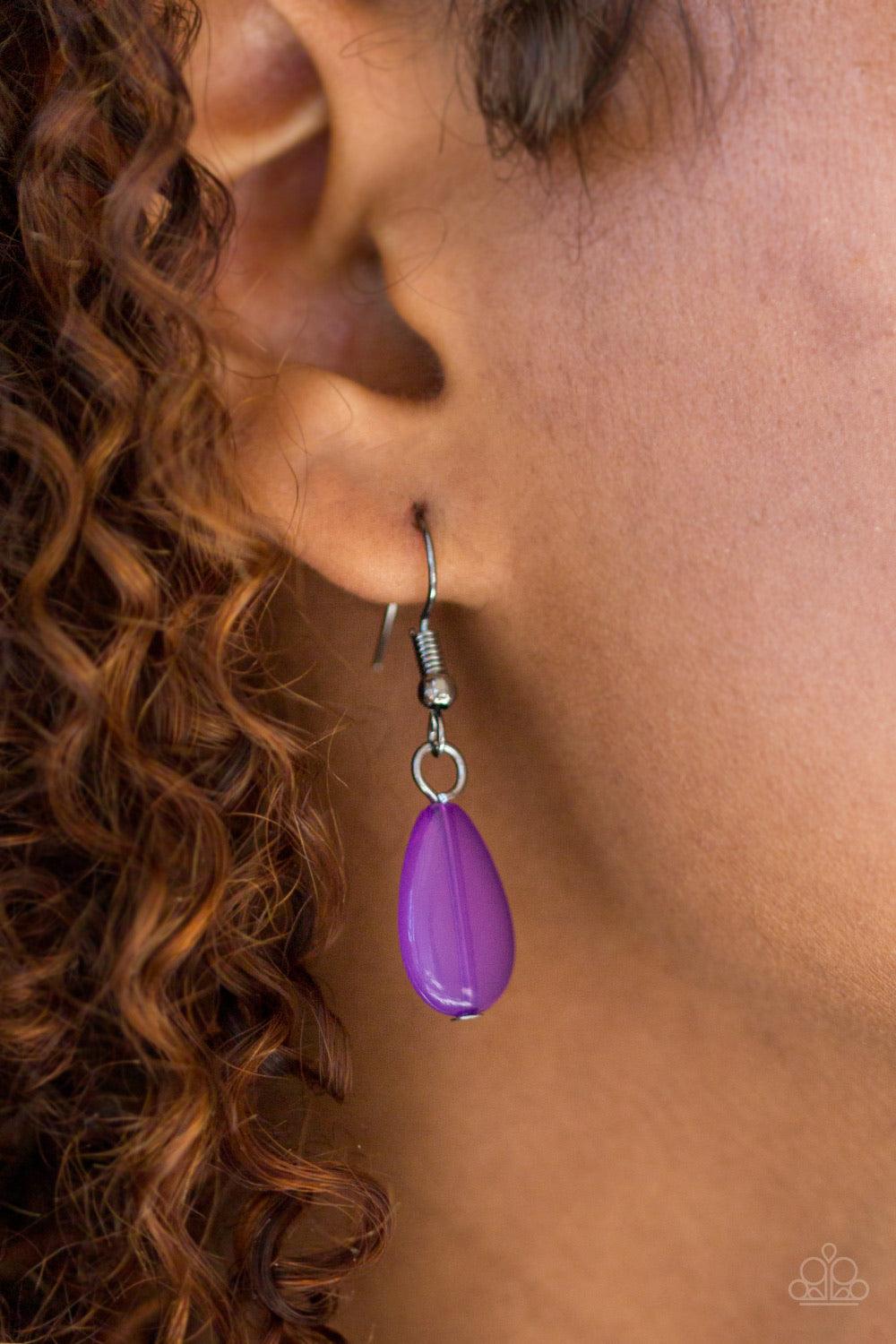 Paparazzi Accessories Diva Attitude - Purple Glistening gunmetal and vivacious purple teardrops drip from the bottom of interlocking gunmetal chains. Matching gunmetal and purple beads trickle down the rows of chain, creating a bold fringe below the colla