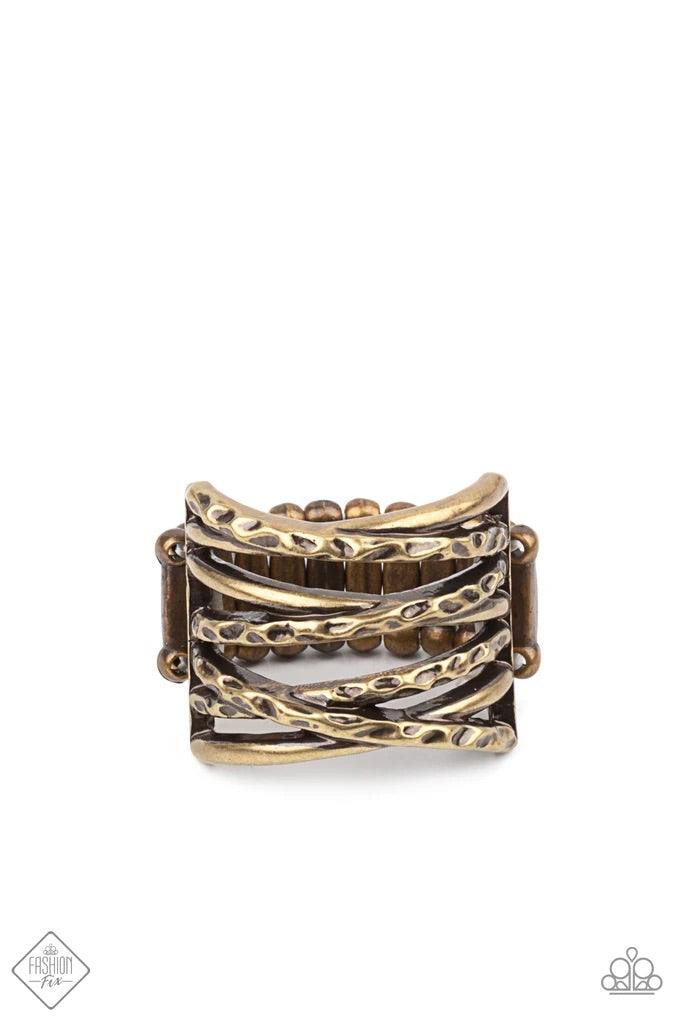 Paparazzi Accessories Switching Gears - Brass Brushed in an antiqued shimmer, hammered brass bars twisted in texture crisscross across the finger for a gritty stacked look. Features a stretchy band for a flexible fit. Sold as one individual ring. Jewelry